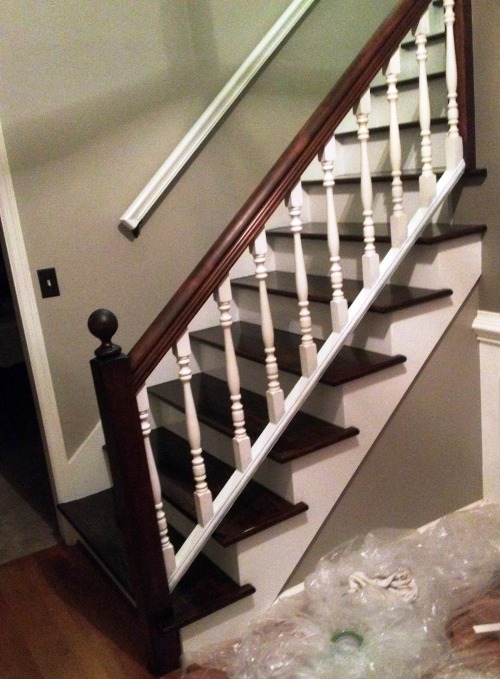 Taking the carpet off the stairs