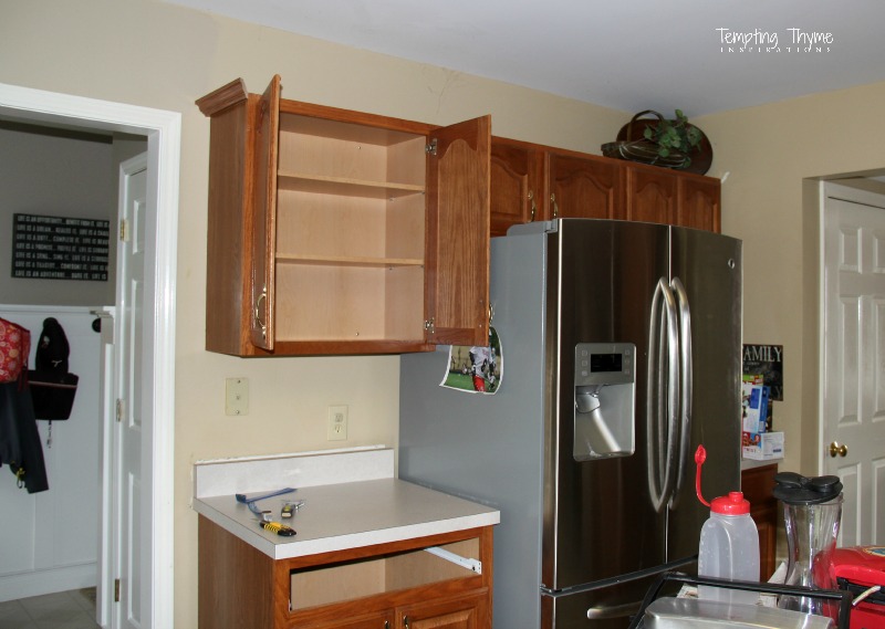 Installing a refrigerator cabinet not only gives you more storage space, but can make your kitchen look more customized.
