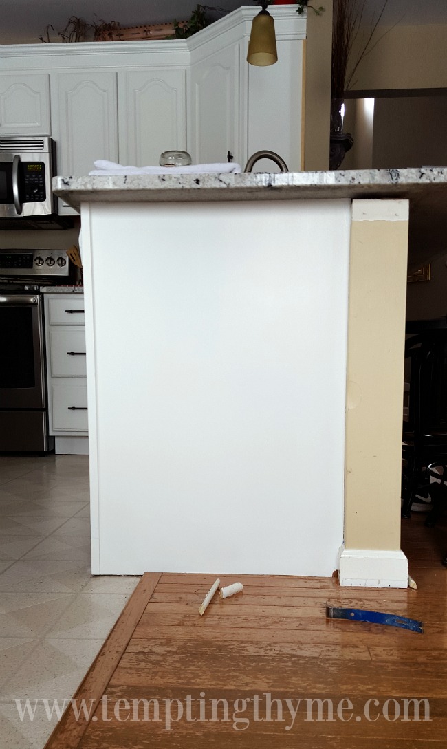 Adding molding to kitchen cabinets