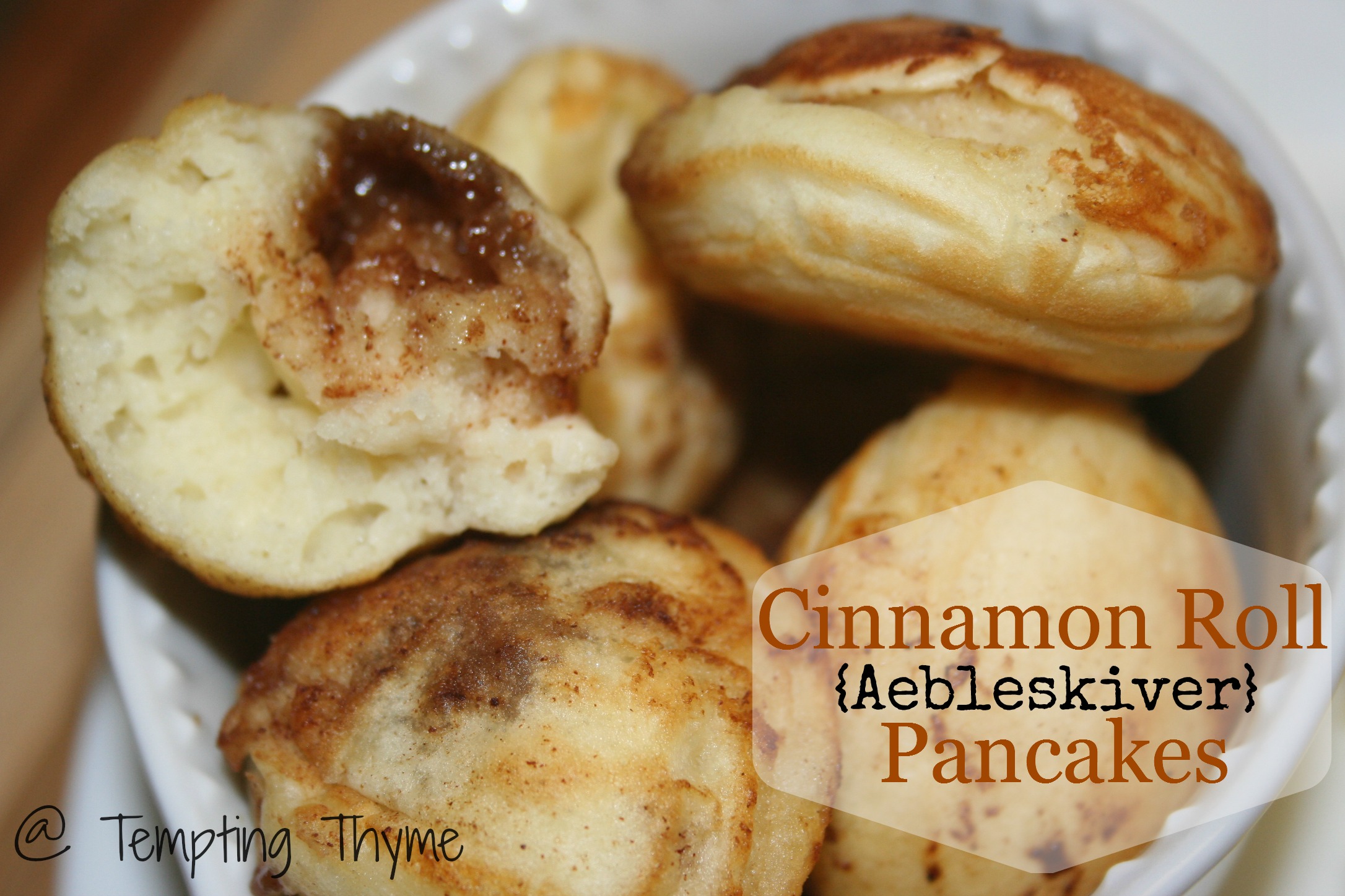 https://temptingthyme.com/wp-content/uploads/2013/01/cinnamon-roll-aebleskiver-pancakes.jpg