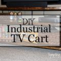Iron and wood combining to make the perfect industrial tv cart/stand.